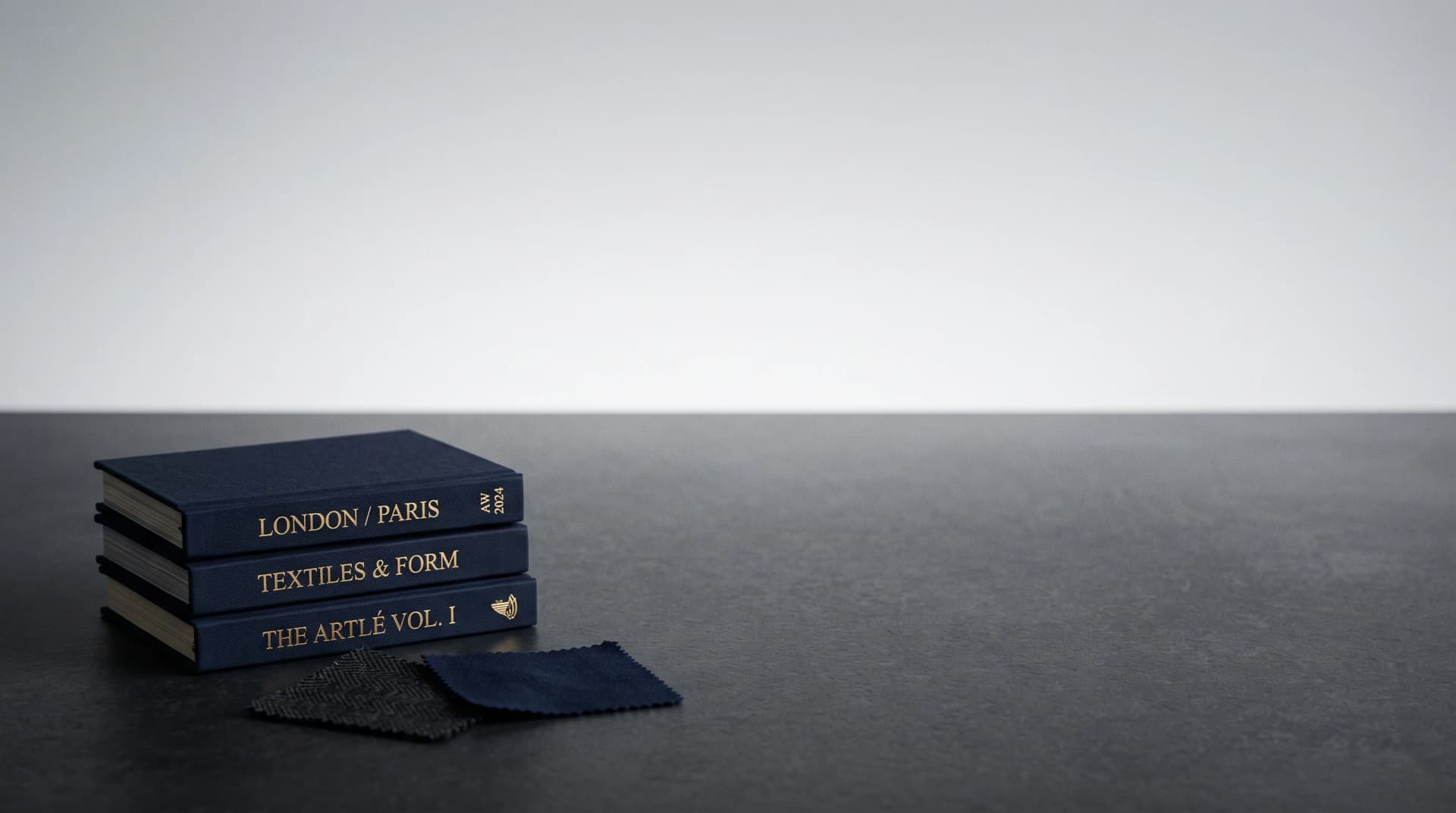 White Cotton playbooks on a factory table